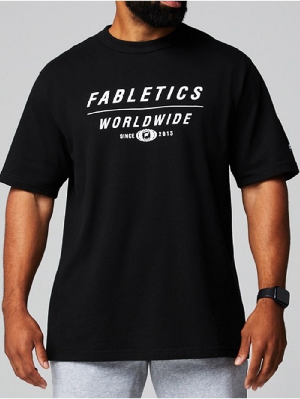 Fabletics Black Short-Sleeve Tee with White 'Fabletics Worldwide' Graphic